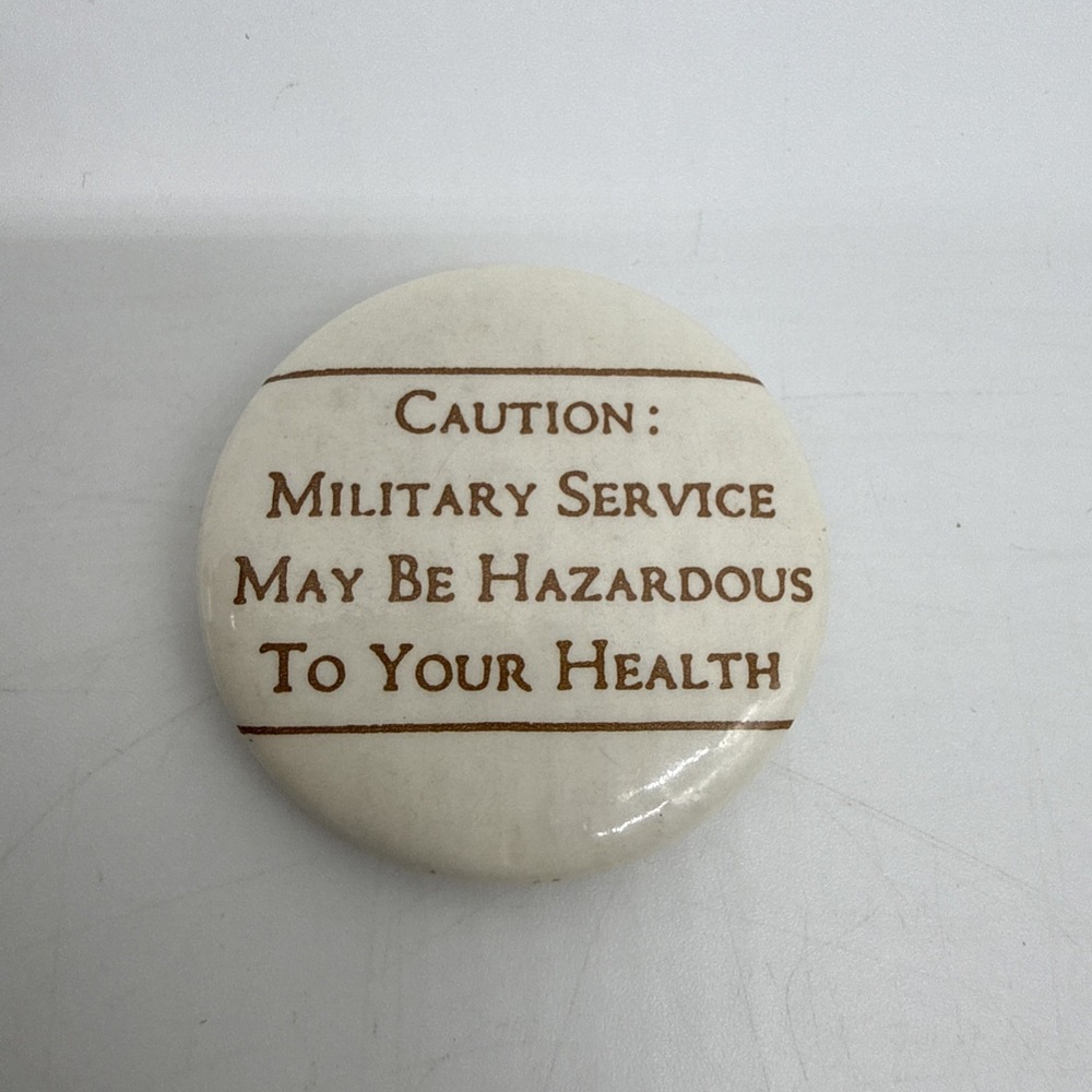 Vintage "Caution: Military Service May Be Hazardous To Your Health" Anti-War Pin